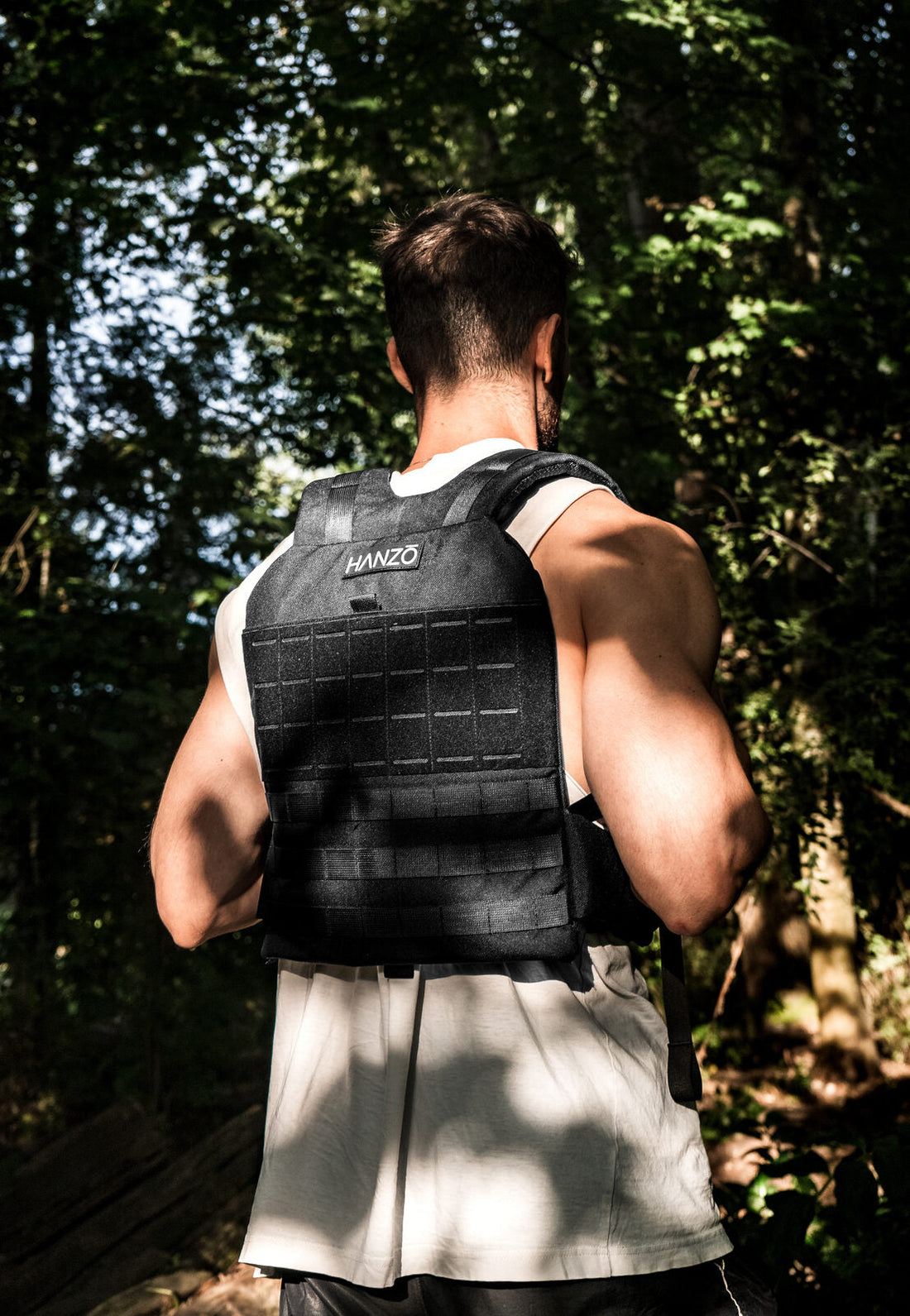A lone athlete training outdoors in the HANZO weighted vest